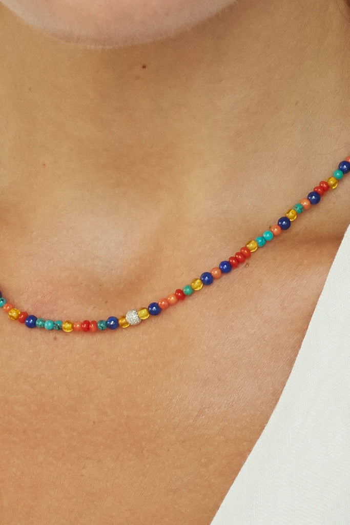 Zoomed crop on model of 14K Diamond Multi-Bead Necklace Necklace bagatiba