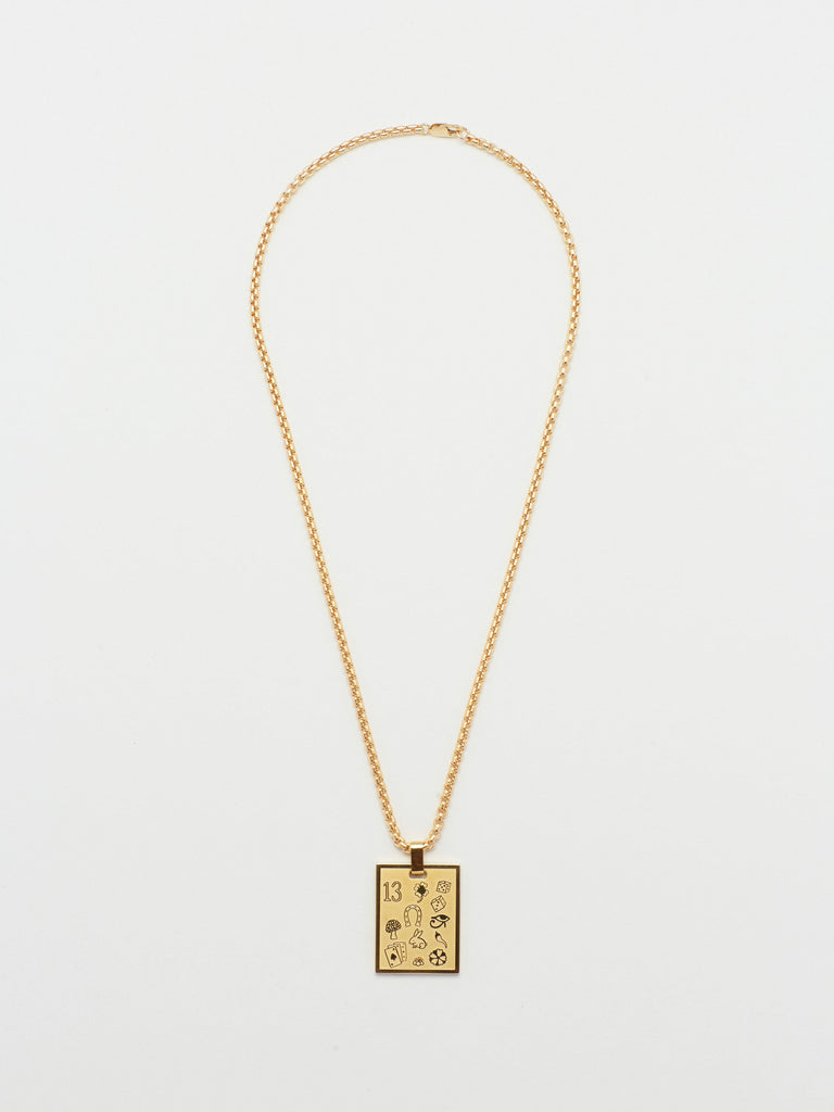 Full view flat lay of 16" Snake Chain Necklace with Lucky Charm  bagatiba
