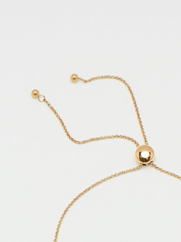 Detail flat lay of clasp on Adjustable Gold Tab Necklace Necklace bagatiba