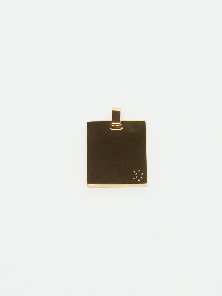 Close view flat lay of reverse side Bagatiba Lucky Charm charm Bagatiba