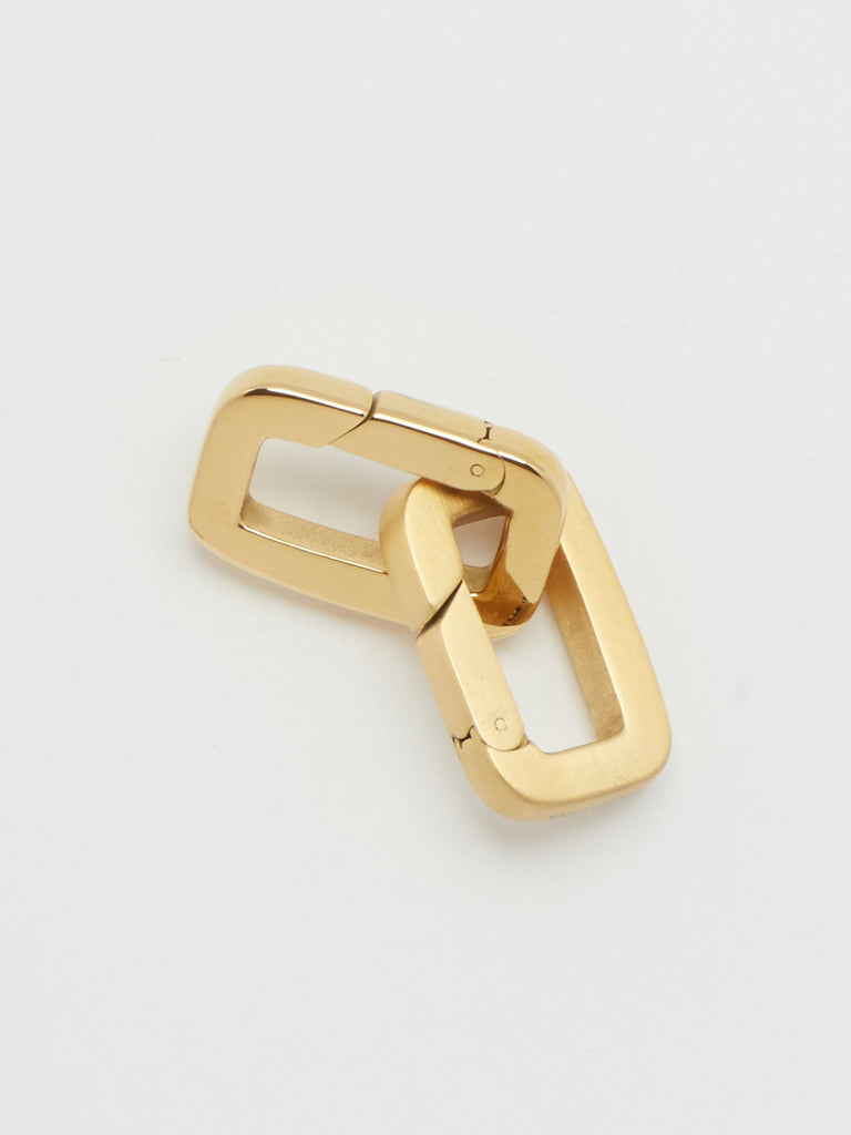 Detail flat lay view of Brushed Gold Cara Clip linked with Gold Cara Clip  Bagatiba