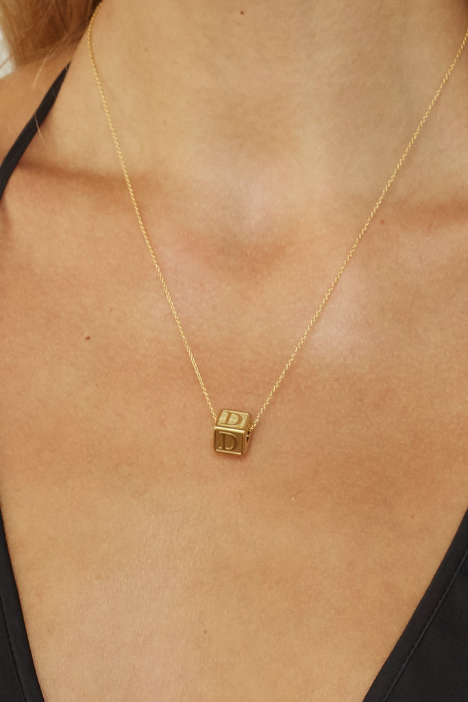 Close up on model "D" Letter Block letter on simple chain  Bagatiba