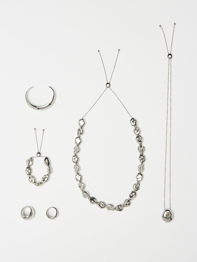 Flat lay view of Silver Orb Collection including Large Silver Orb Ring Ring bagatiba