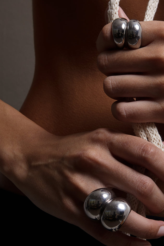 Large Silver Orb Rings stacked together