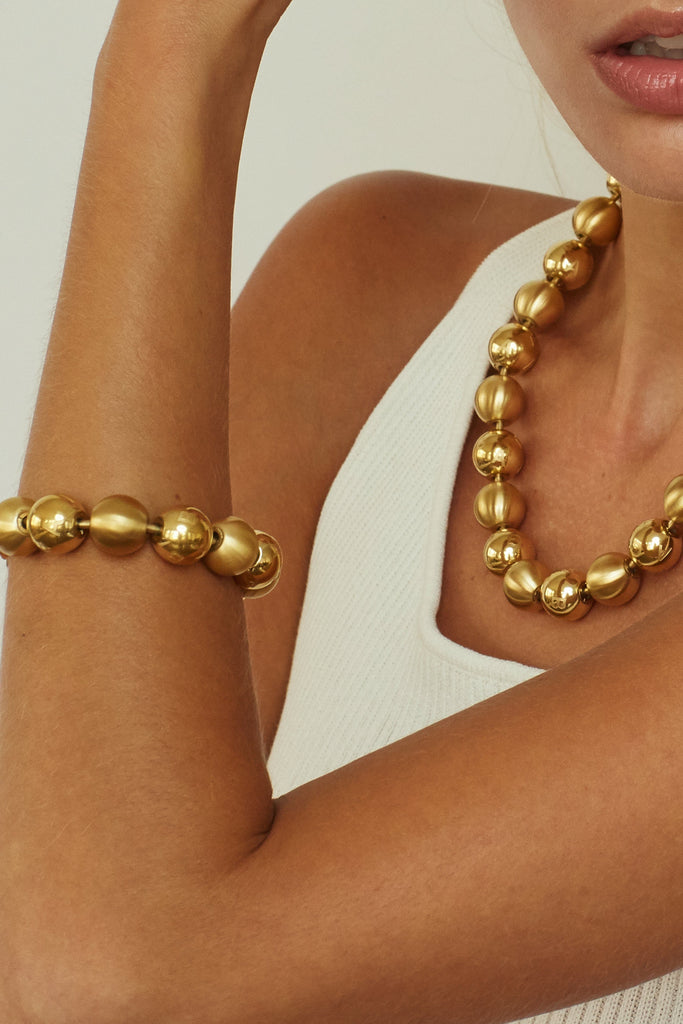 Crop detail view on model of Mixed Sphere Necklace Necklace bagatiba