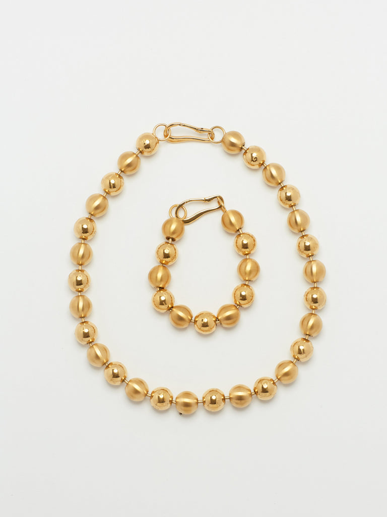 Full view flat lay of Mixed Sphere Necklace and Bracelet  bagatiba