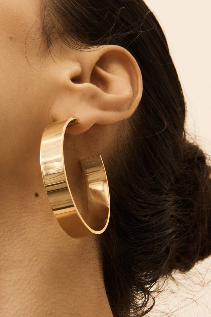 Close view on model of Oversized Roma Hoops Earrings Bagatiba
