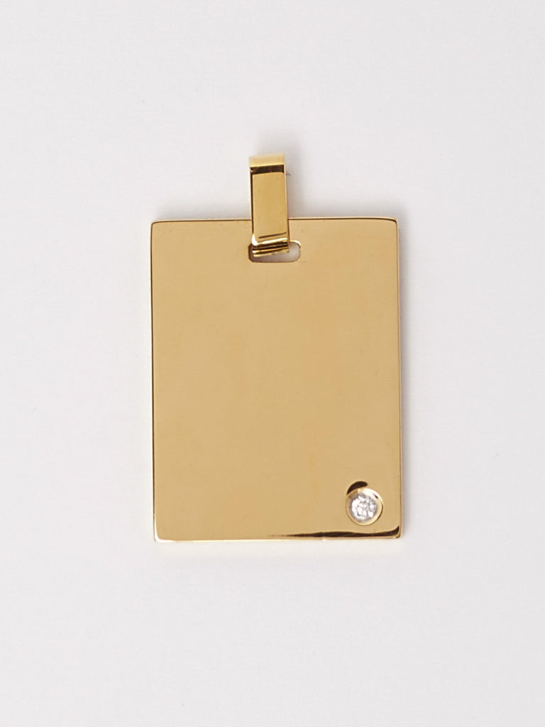 Flat lay of the reverse side of Sagittarius Charm by Bagatiba