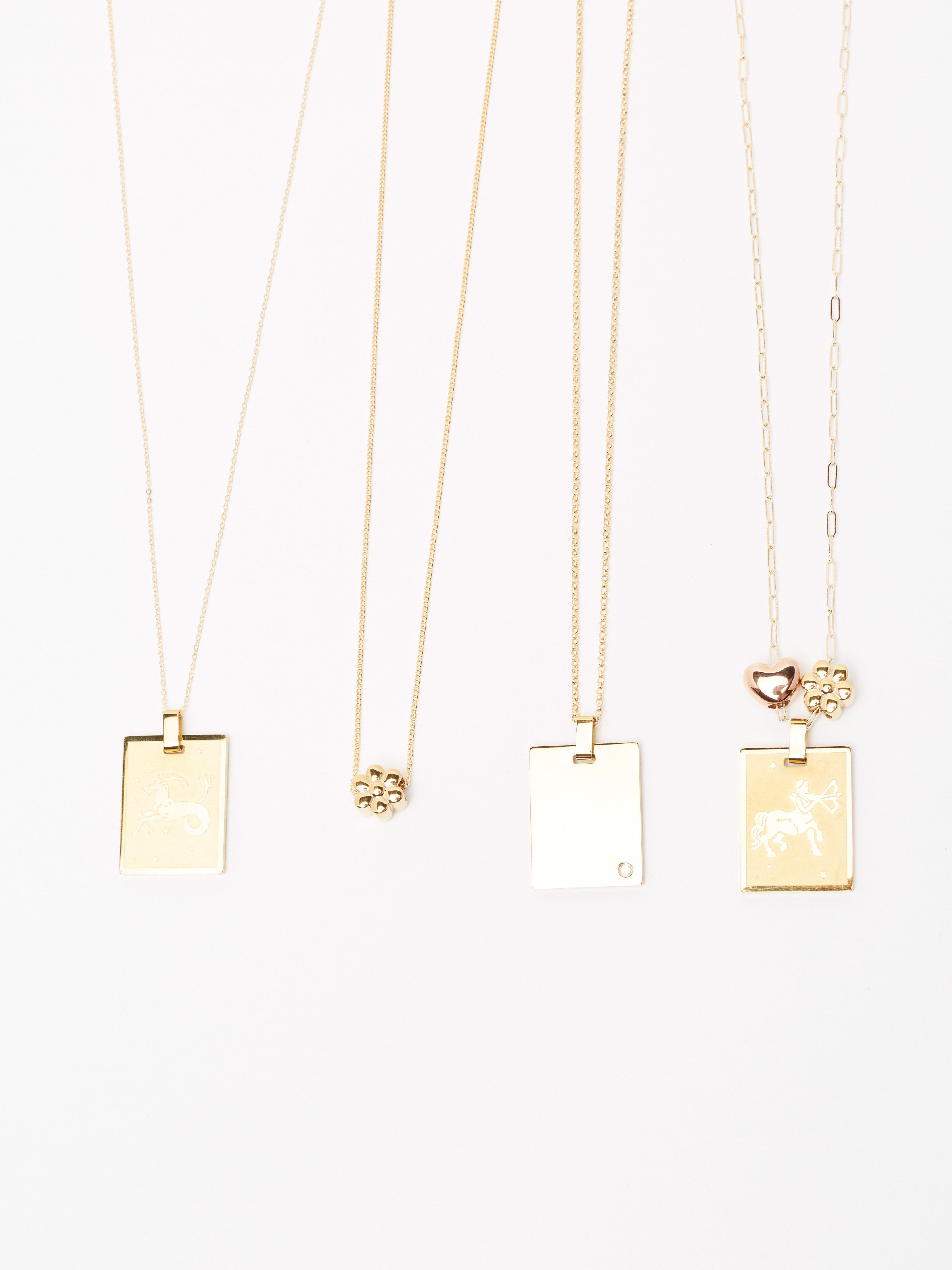 Cropped flat lay of 26" Link Chain Necklace compared to other Necklaces bagatiba 