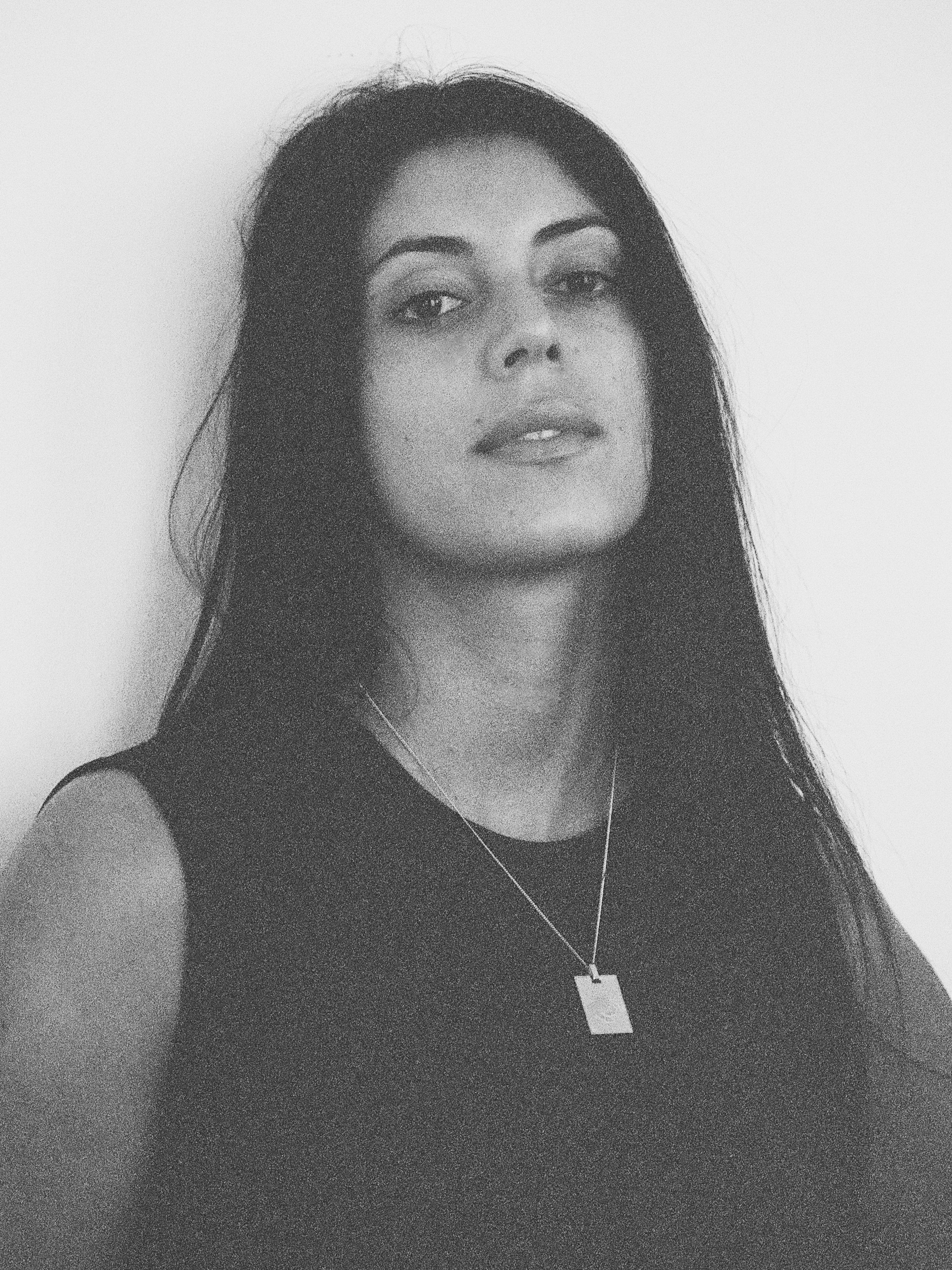Black and white photo of model in Cancer Charm charm Bagatiba 