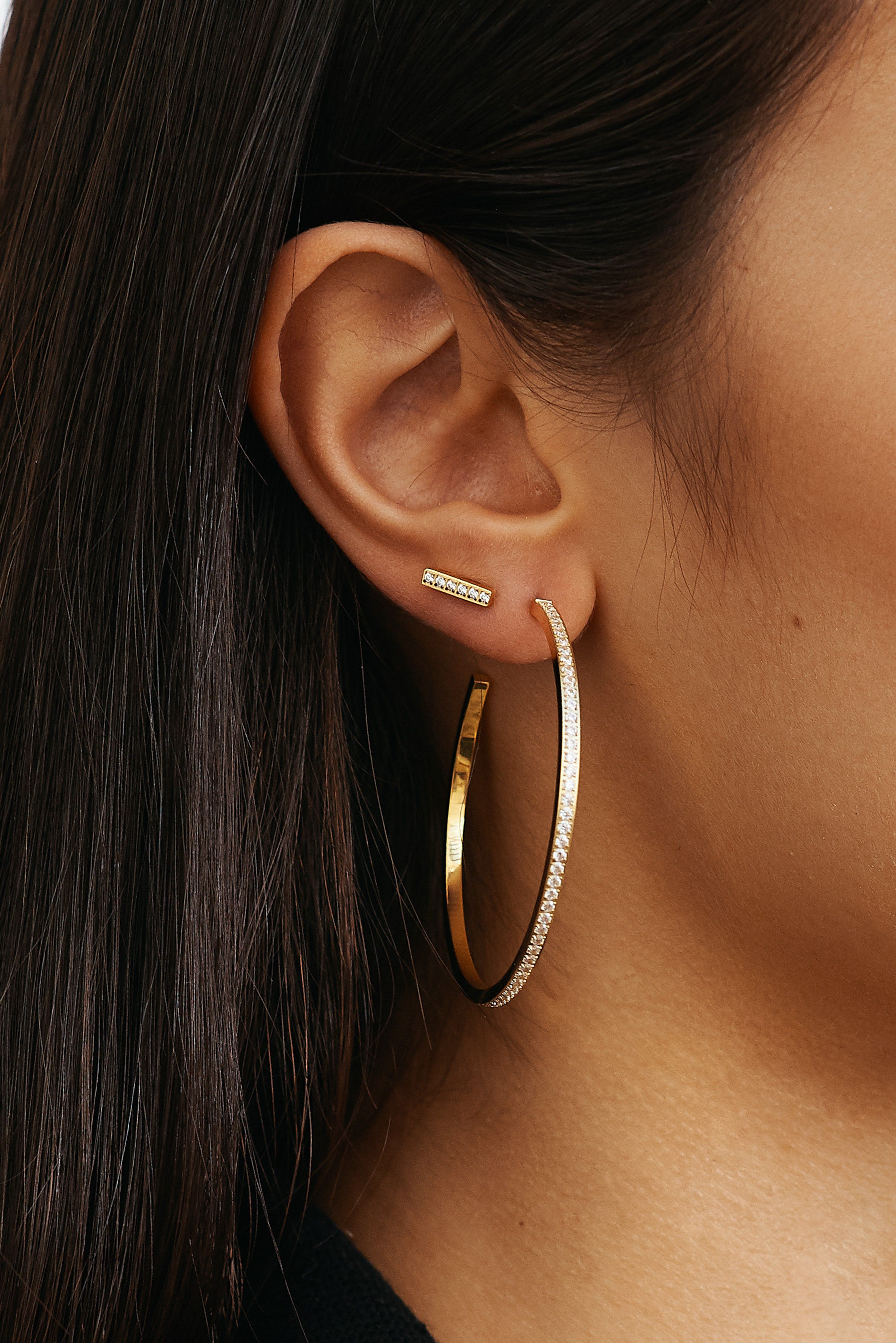 Cropped view on model with Diamond Bar Studs and Medium Diamond Hoops  Earrings Bagatiba 