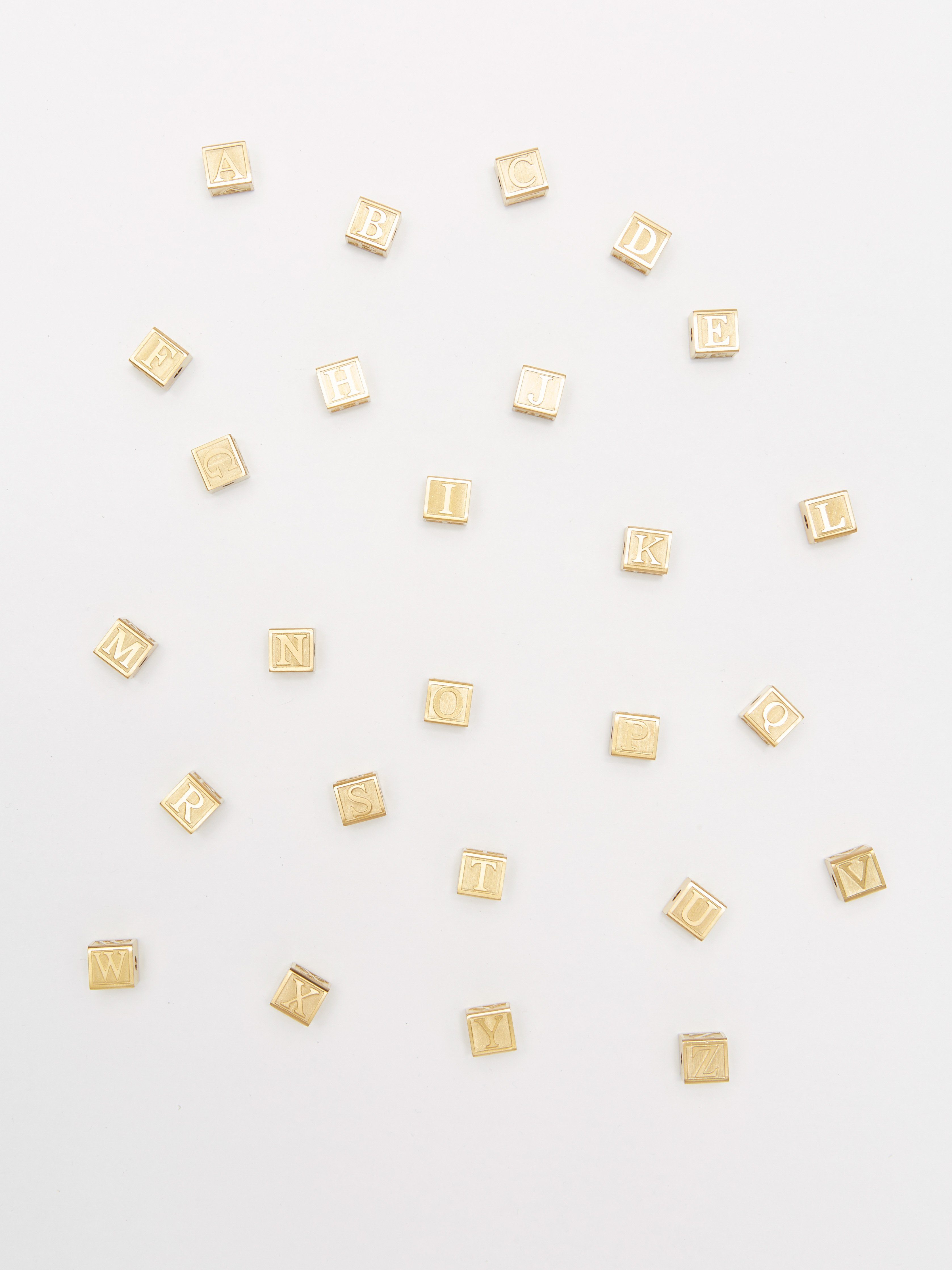 Full view flat lay of multiple Letter Blocks Bagatiba