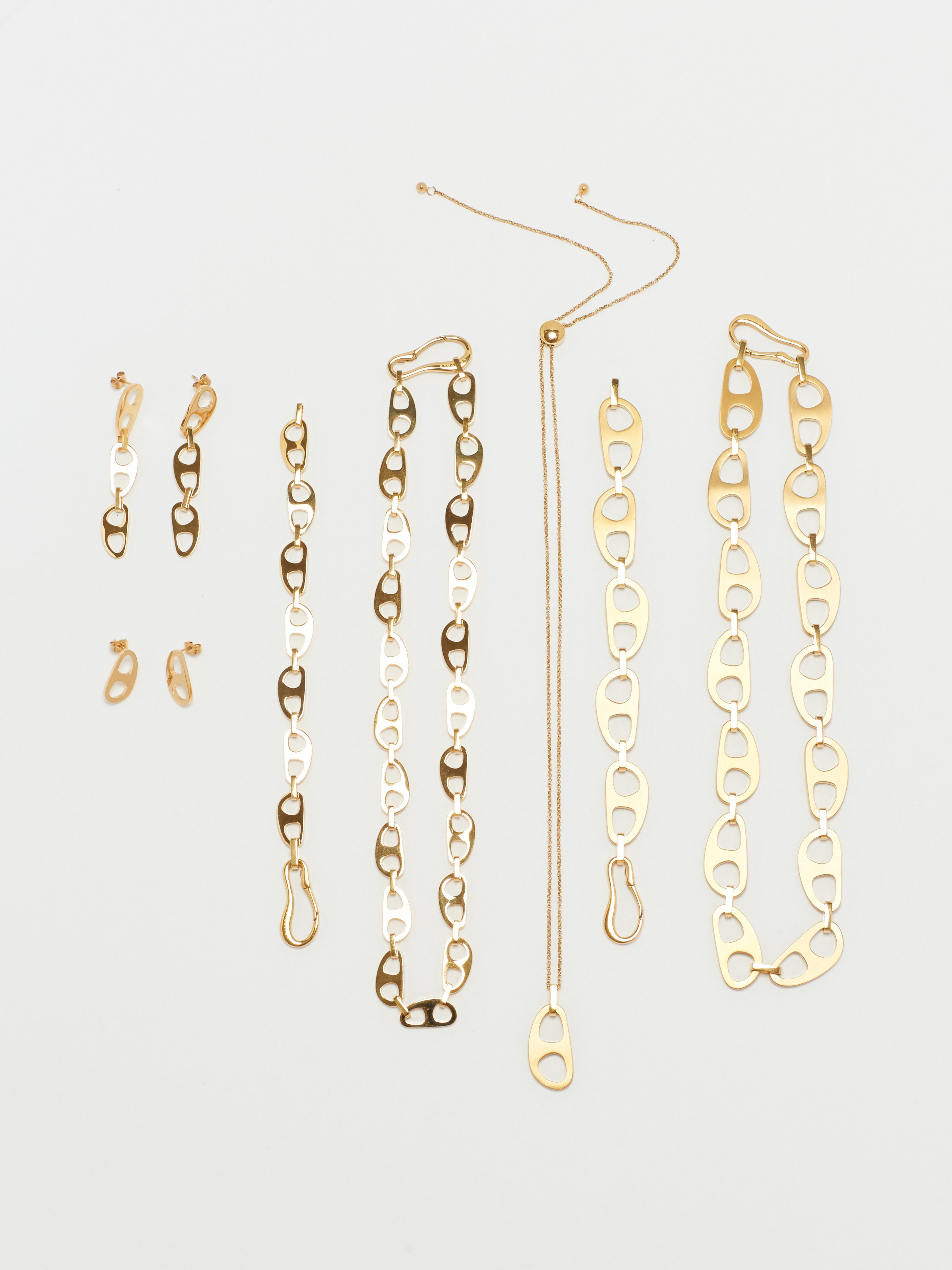 Full view flat lay of Gold Brushed Tab Necklace with Tab Collectionbagatiba 