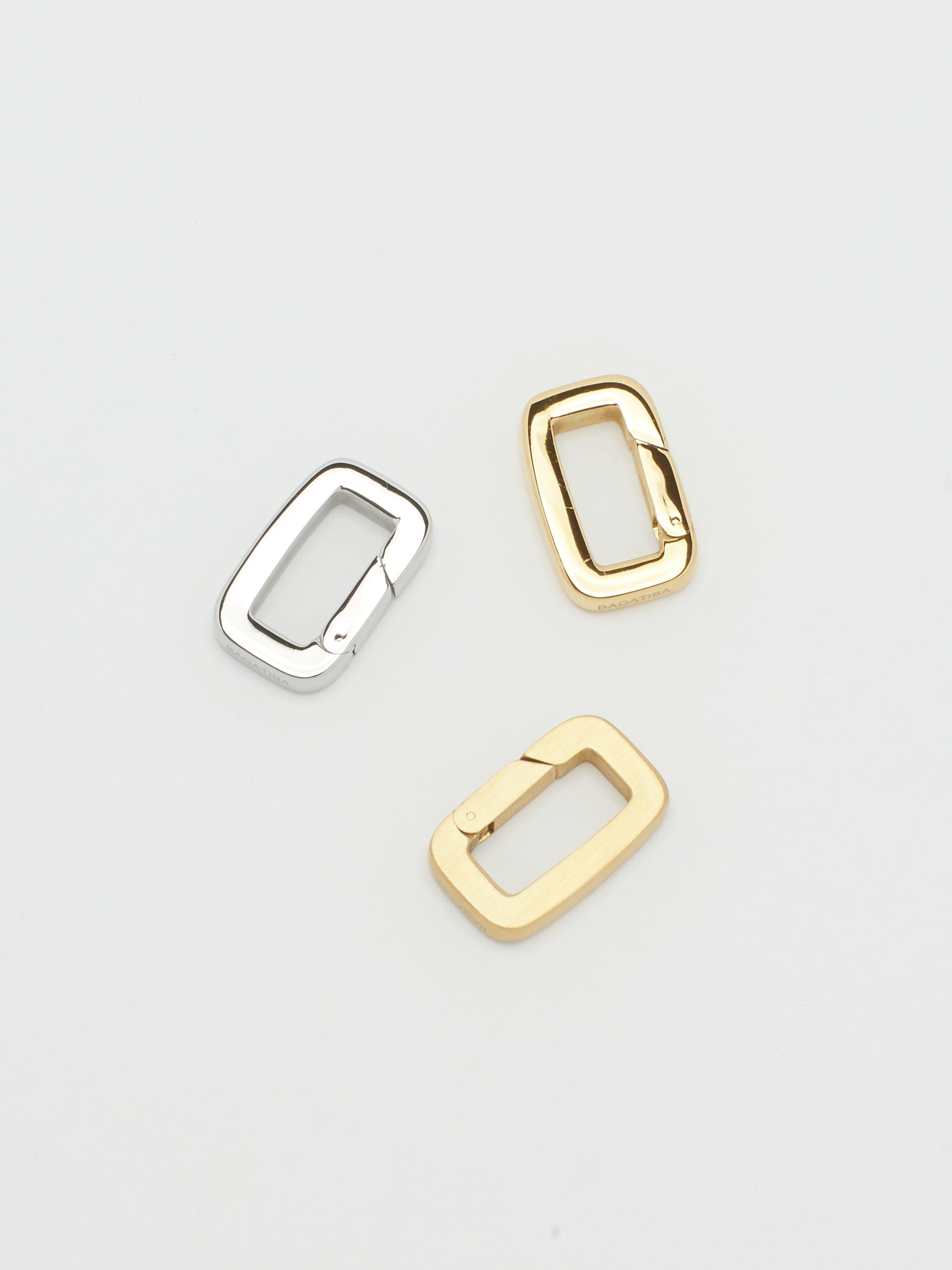 Full view flat lay of Gold, Brushed Gold & Silver  Cara Clip Bagatiba 