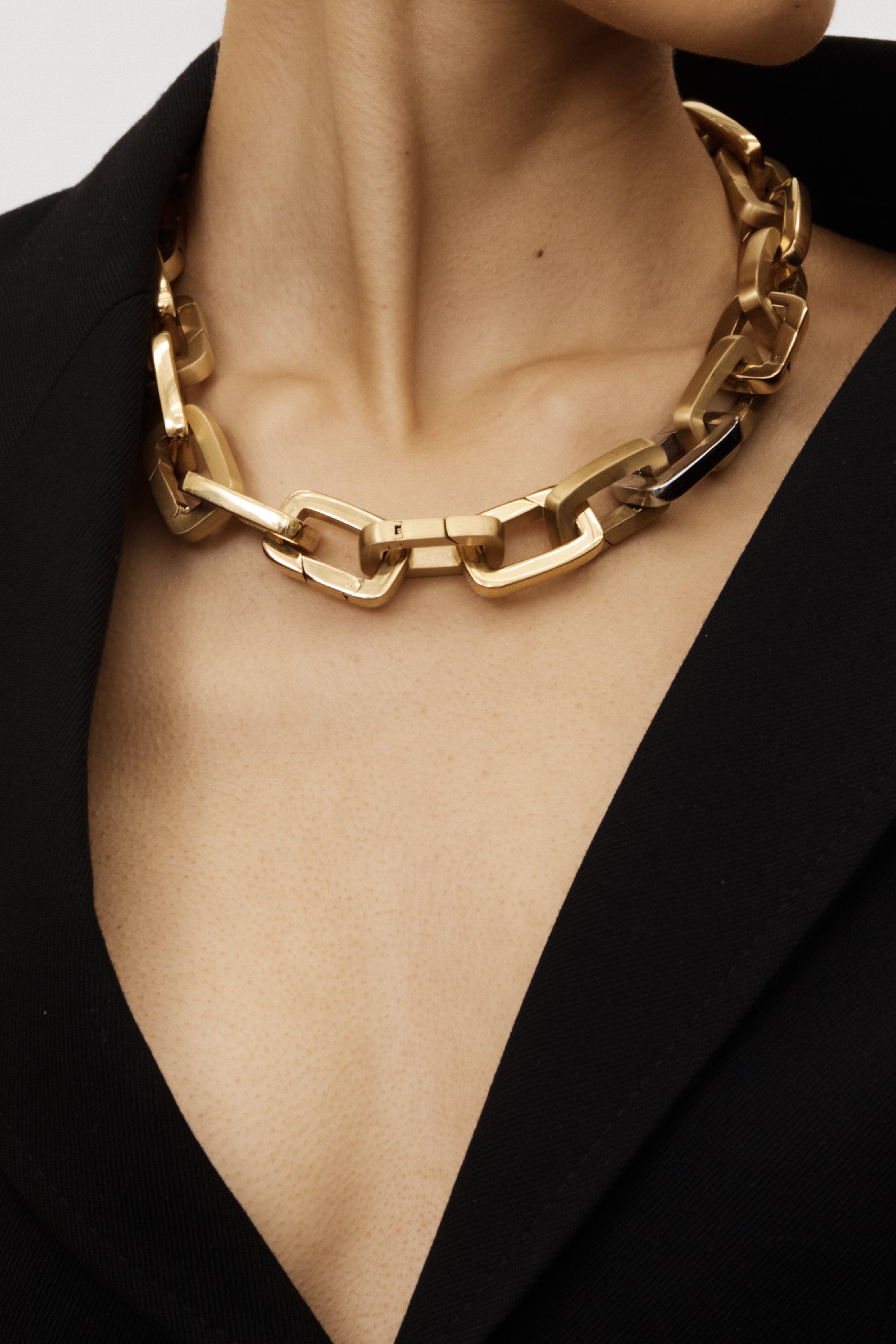 Detail view on model of Gold Cara Clip as necklace  Bagatiba 