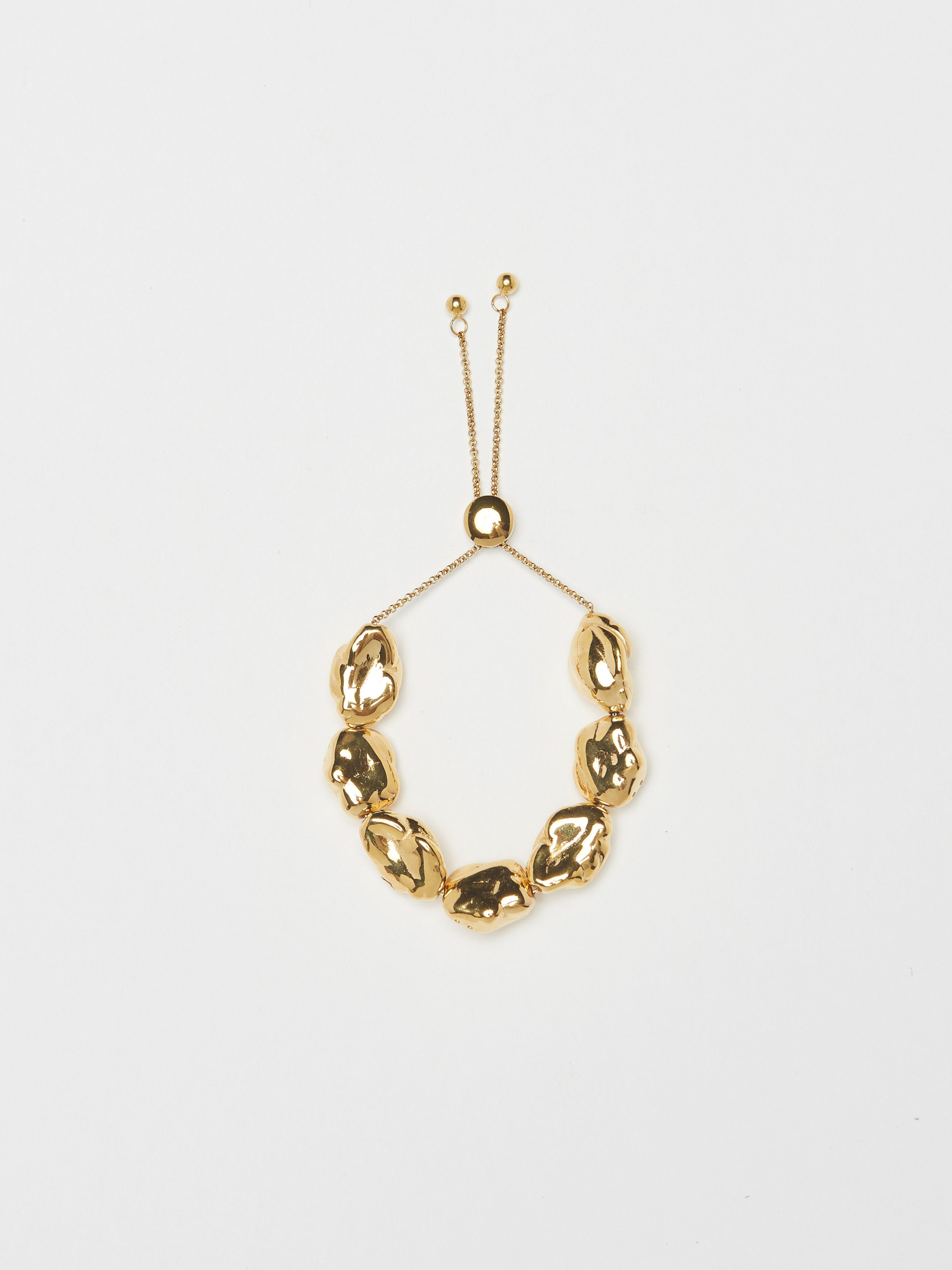 Flat lay view of Gold Pearl Bracelet Bracelet bagatiba 
