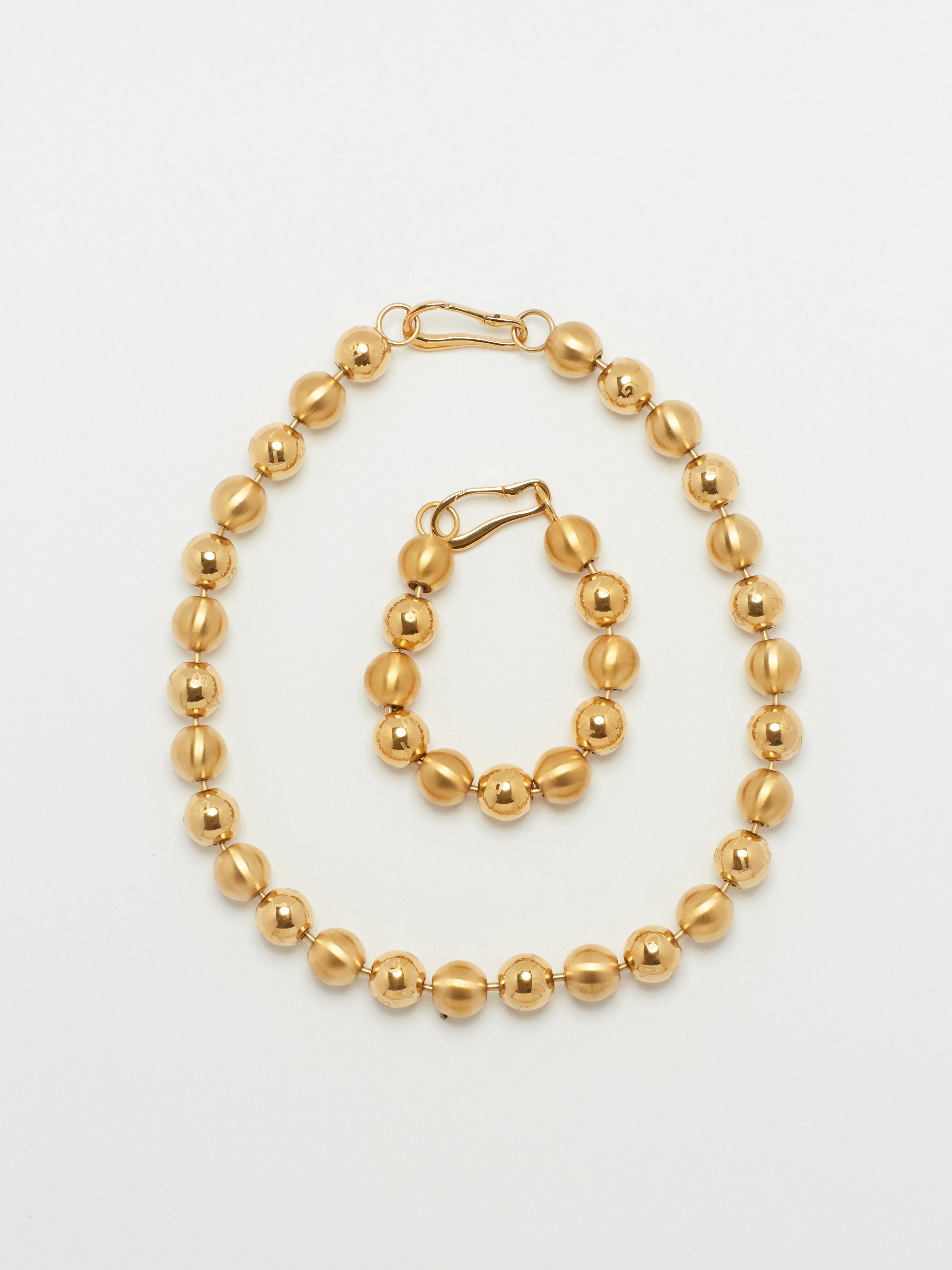 Flat lay view of Mixed Sphere Bracelet & Necklace bagatiba 
