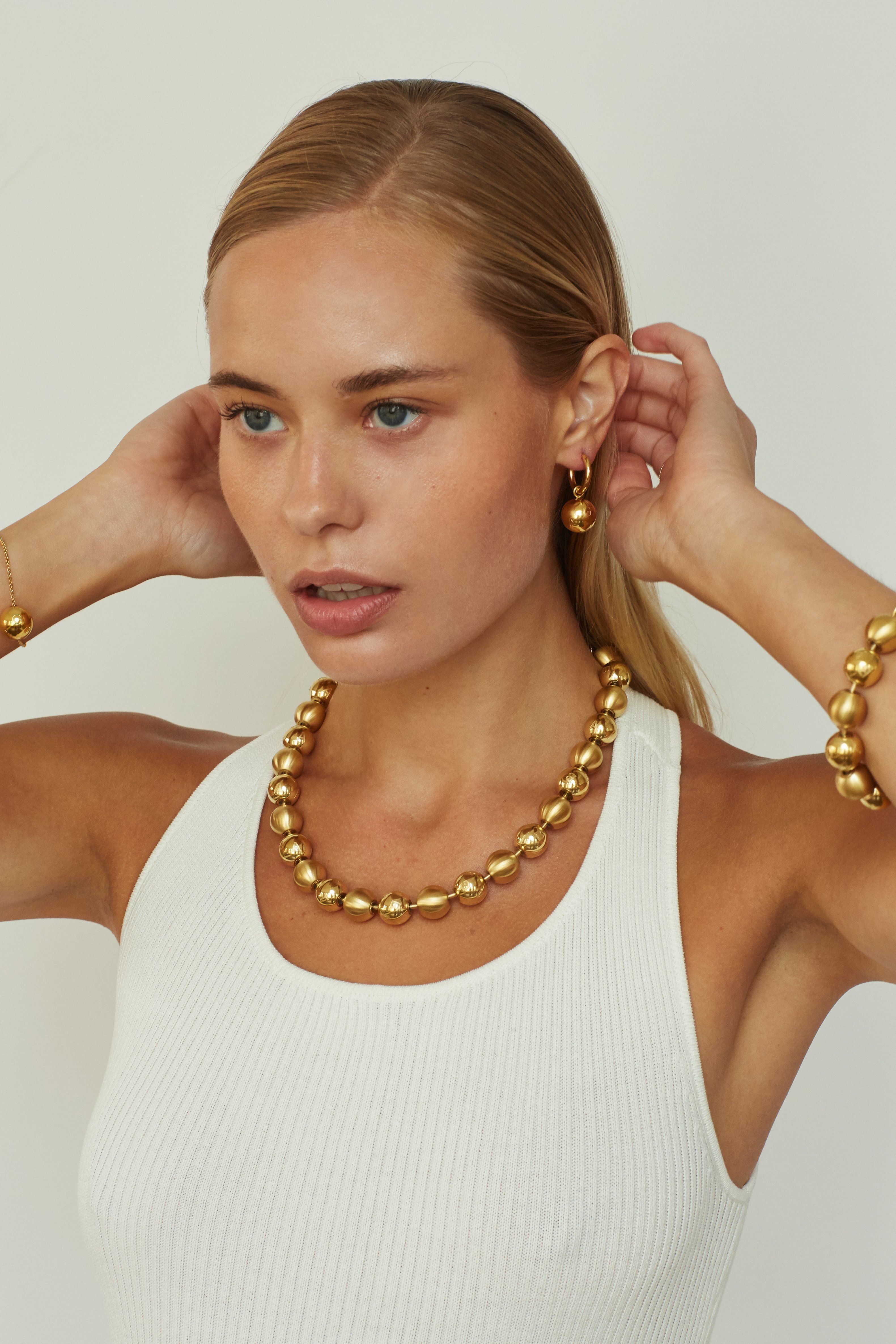 Model wearing the Mixed Sphere Bracelet Necklace bagatiba 