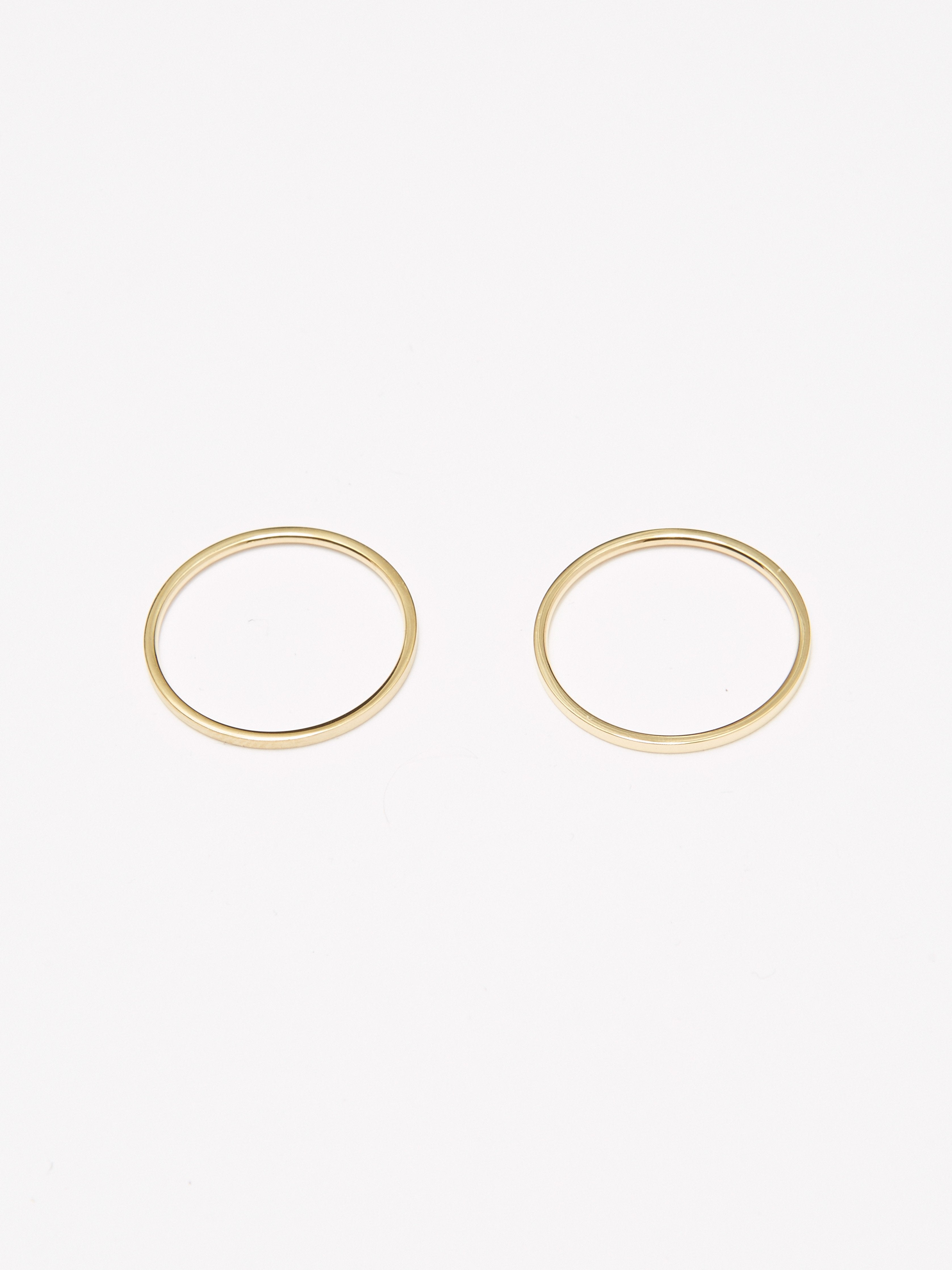 Flat lay image of two Polished Gold Ring Ring Bagatiba 