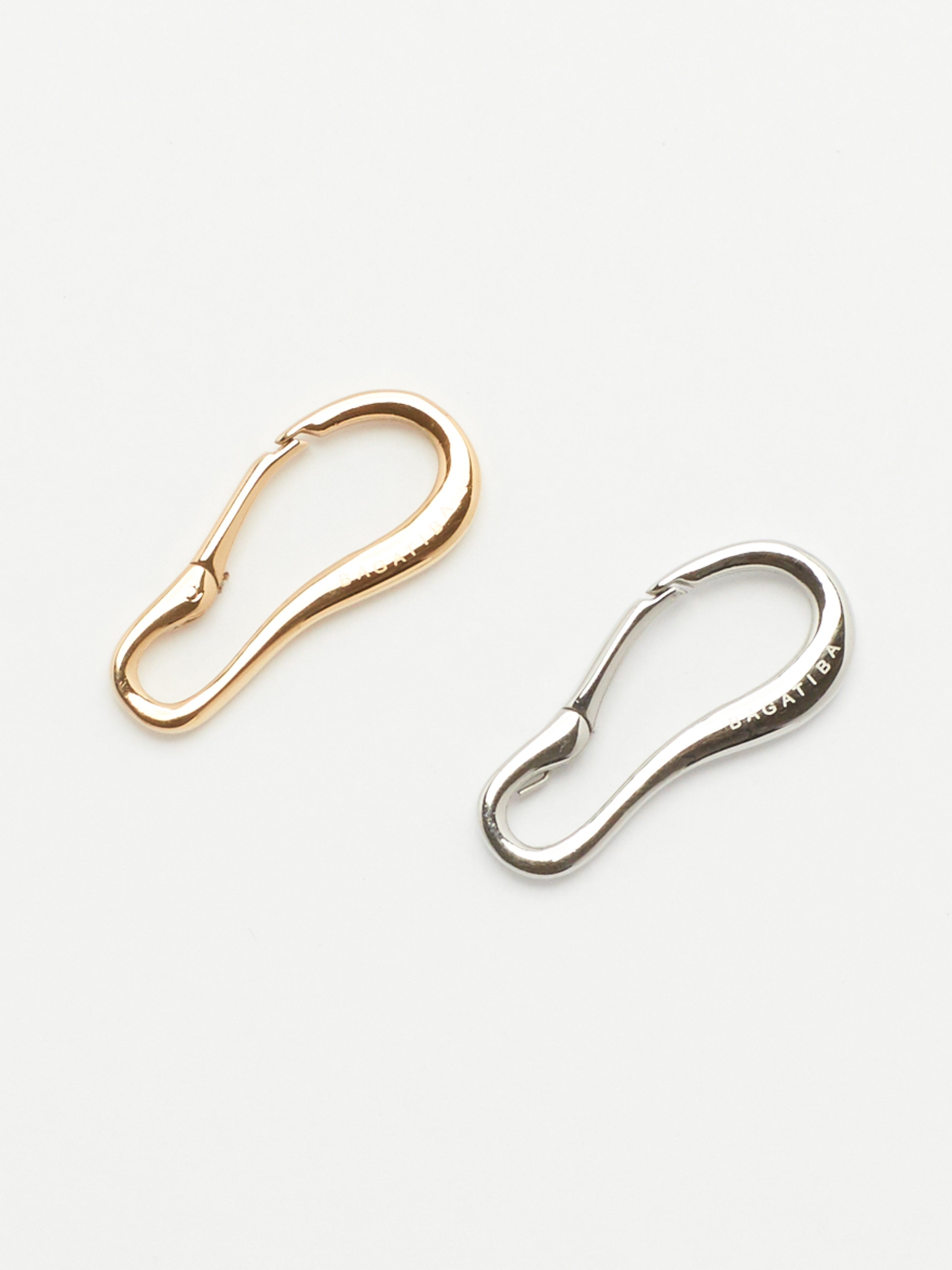 Detailed view flat lay of Gold and Silver Molded Clips Body Bagatiba 
