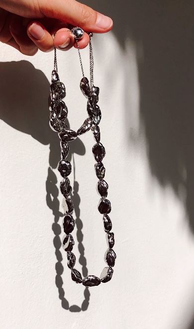 Silver Pearl Necklace and Bracelet shown in natural light 