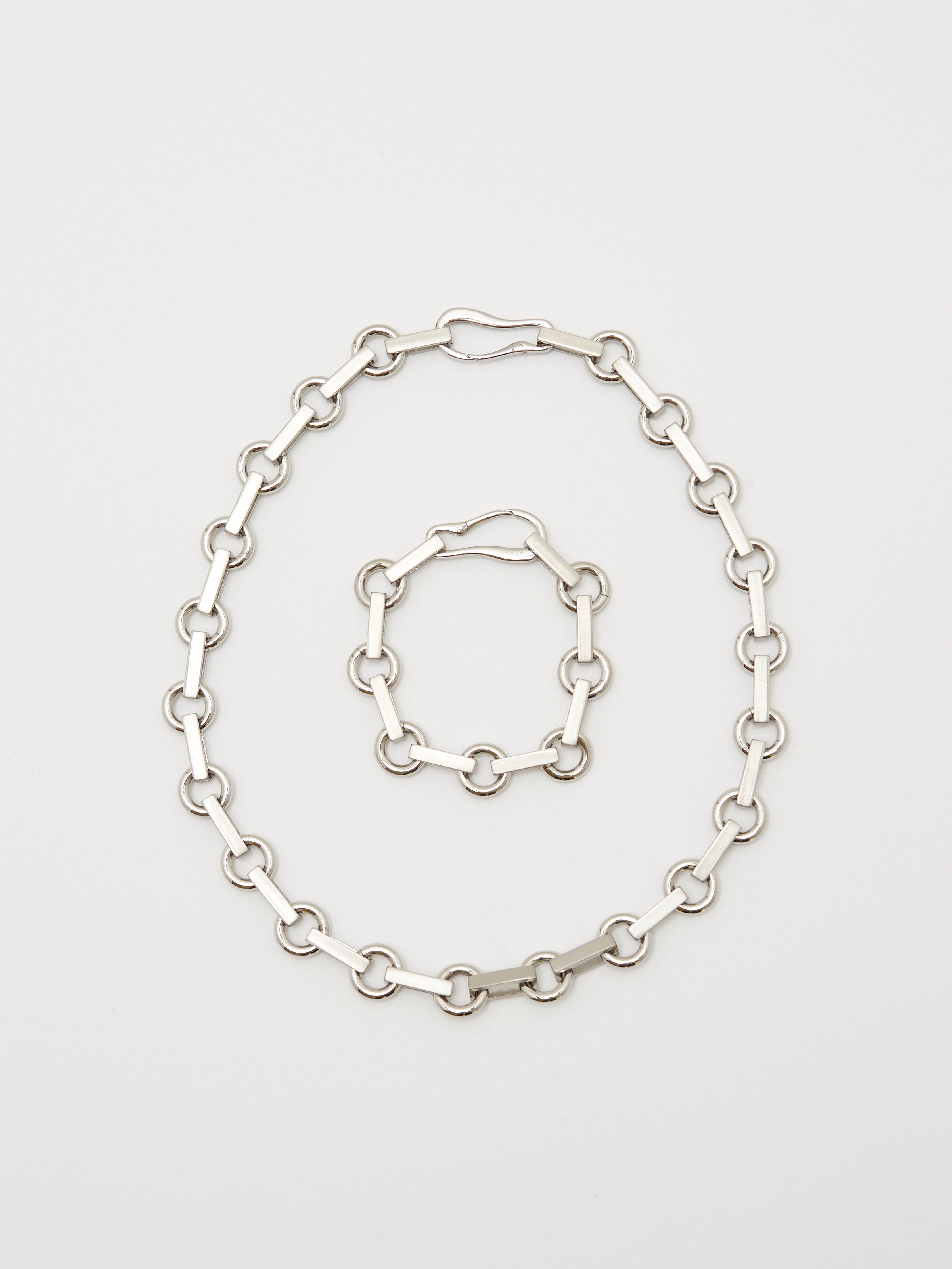 Full view flat lay of the Silver Tilda Bracelet and Necklace bagatiba 