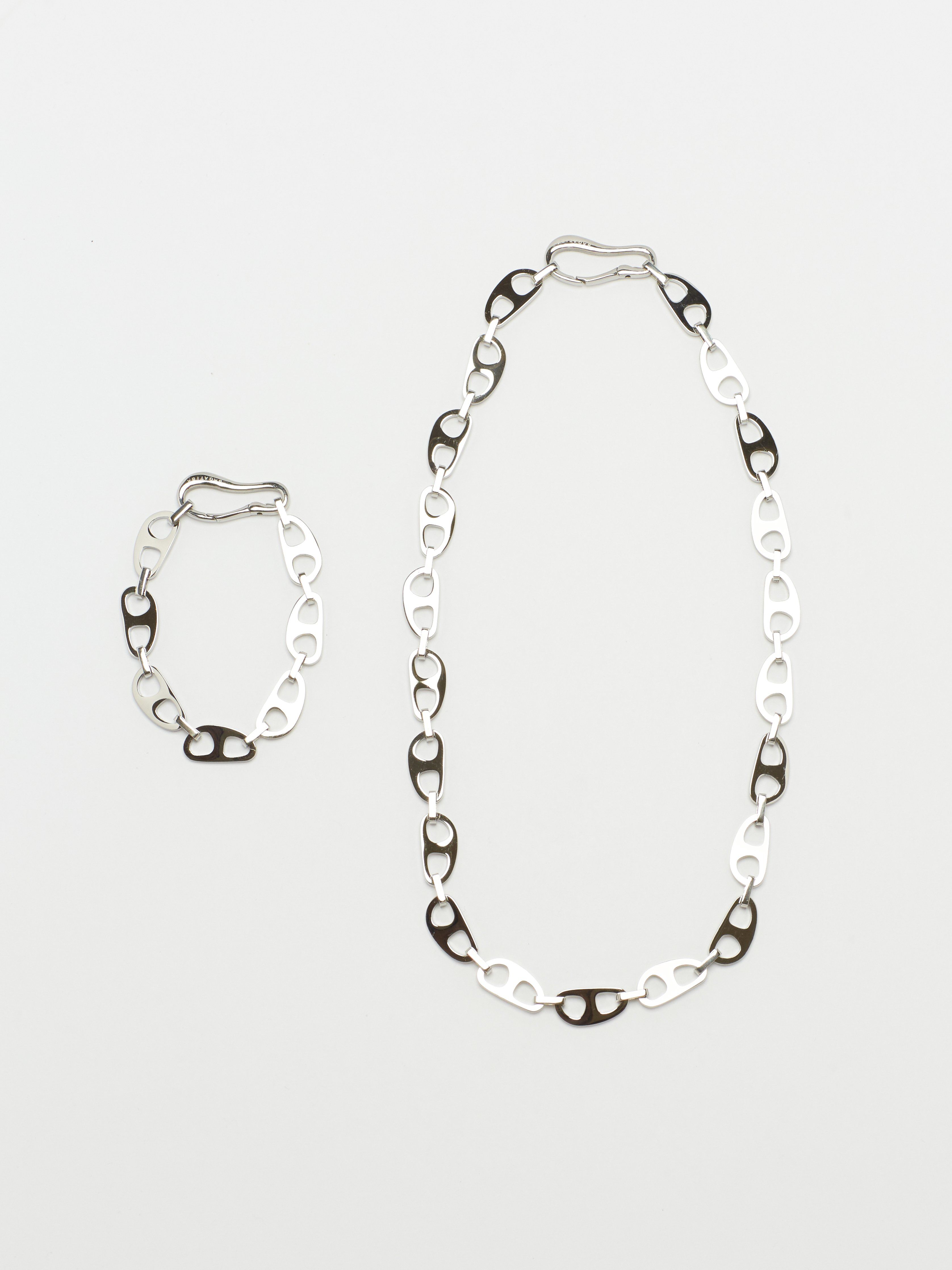Full view flat lay of the Small Silver Tab Bracelet and Necklace bagatiba 