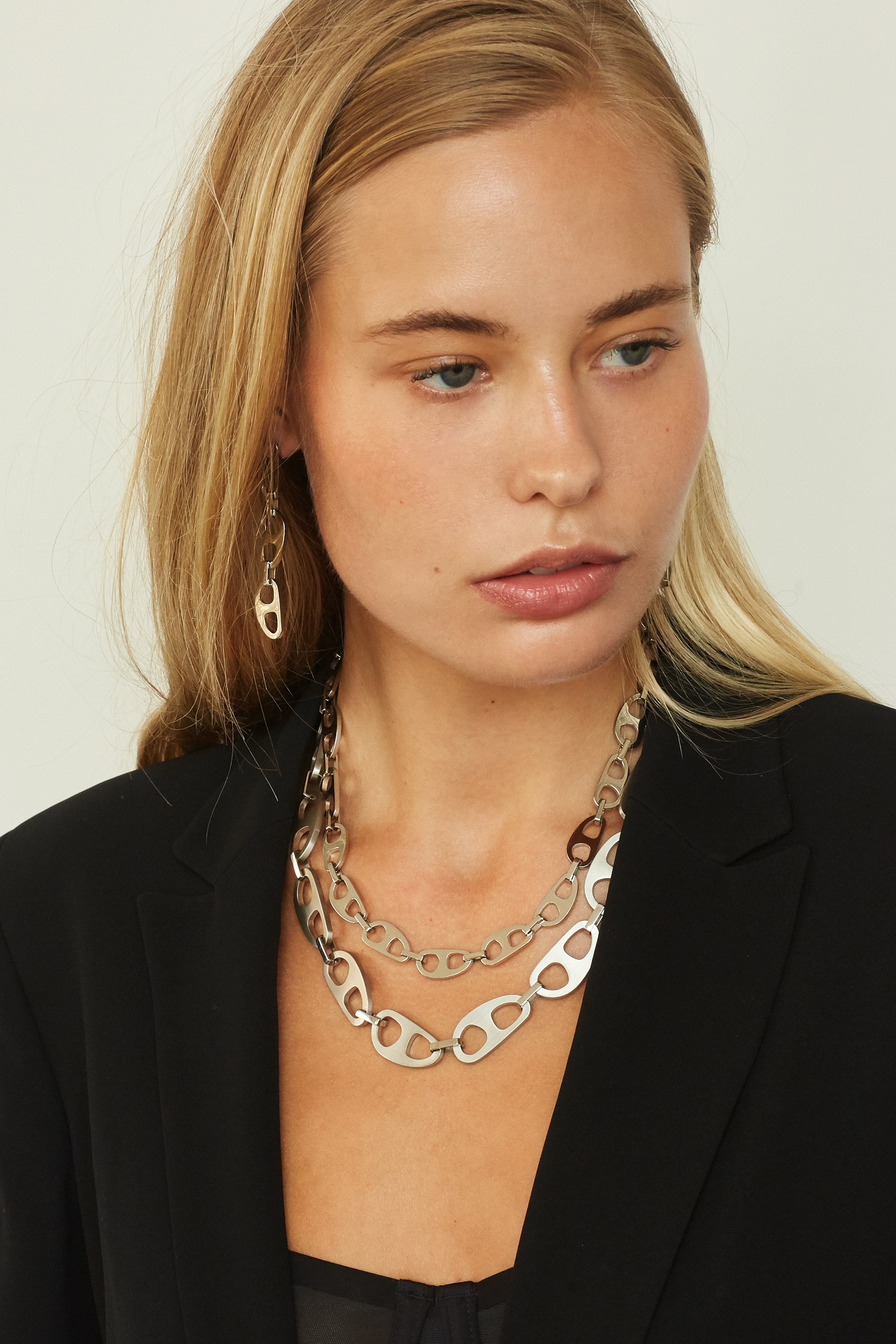 Model wearing the Small Silver Tab Necklace and the Brushed Silver Tab Necklace bagatiba 
