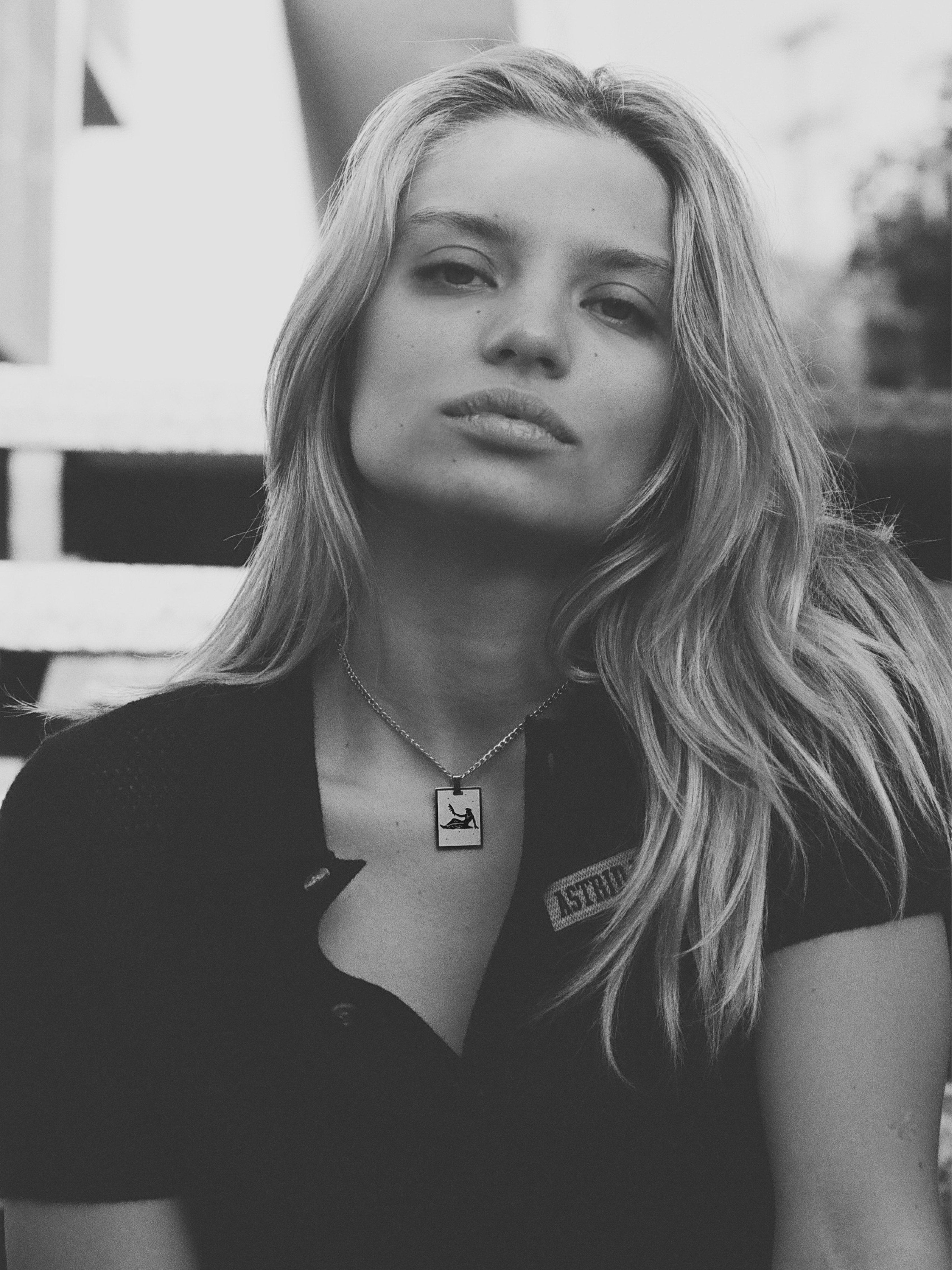 Black and White portrait of a model wearing the Virgo Charm charm Bagatiba 